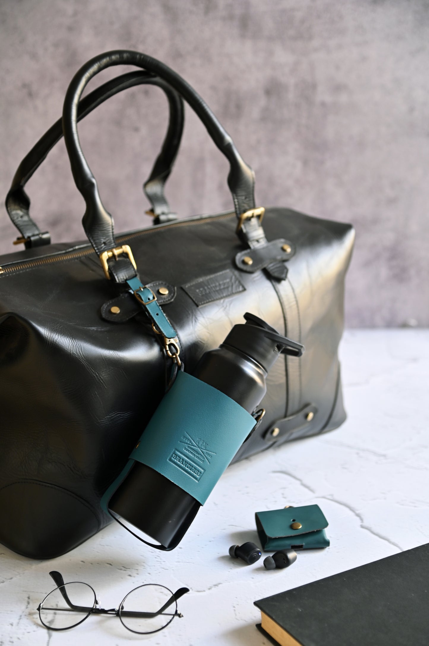 Handcrafted leather bottle carrier with crossbody & hand strap