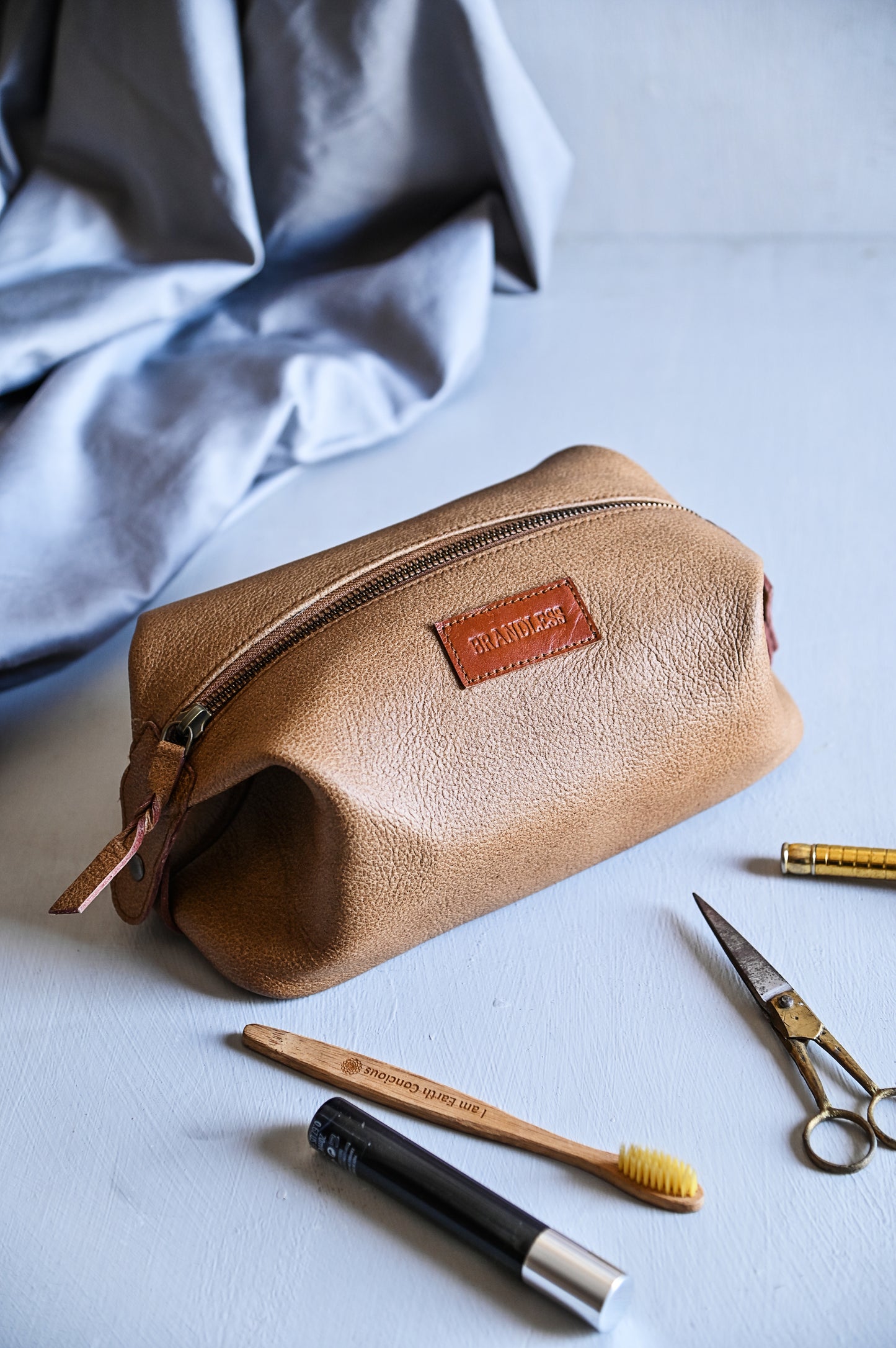 Travel Dopp Kit handcrafted in genuine leather. Mens grooming essential. Luxury Corporate Gifting. Leather Shaving Kit by Brandless