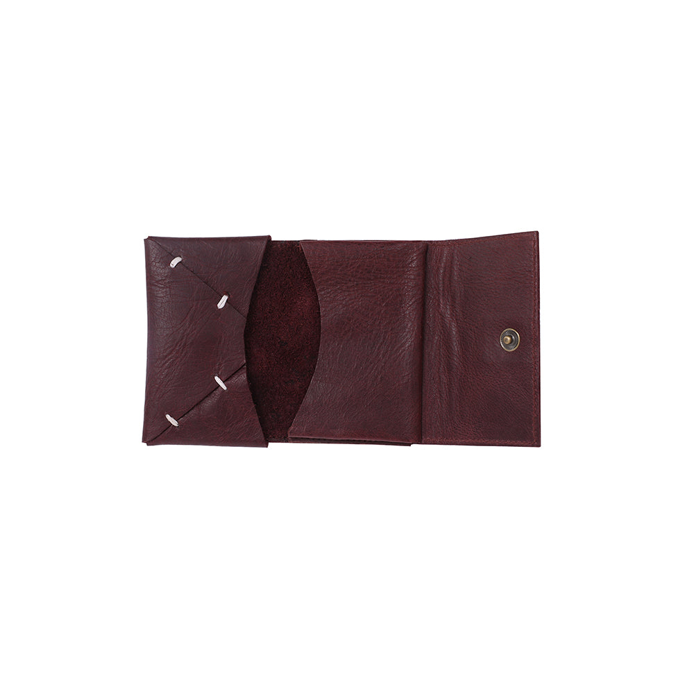 Card Holder is a quintessential accessory in today's fast paced life. Handcrafted in leather, it allows you to keep your cards and a small amount of cash in its folds. You can easily carry the Card Holder in your hand or keep it in your pocket.